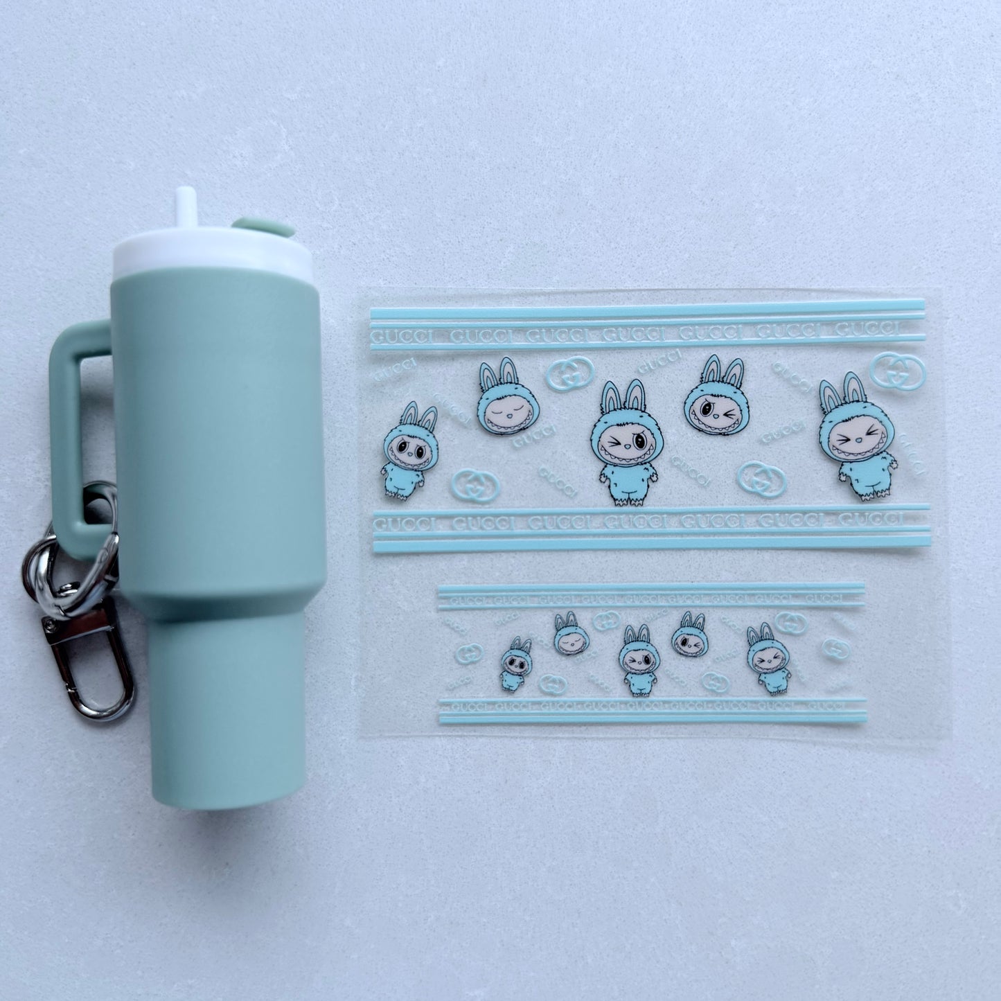 Premium UVDTF Wrap for Mini Tumbler Keychains | Durable, No-Weed Peel & Stick (designer gg aqua/blue labubu)