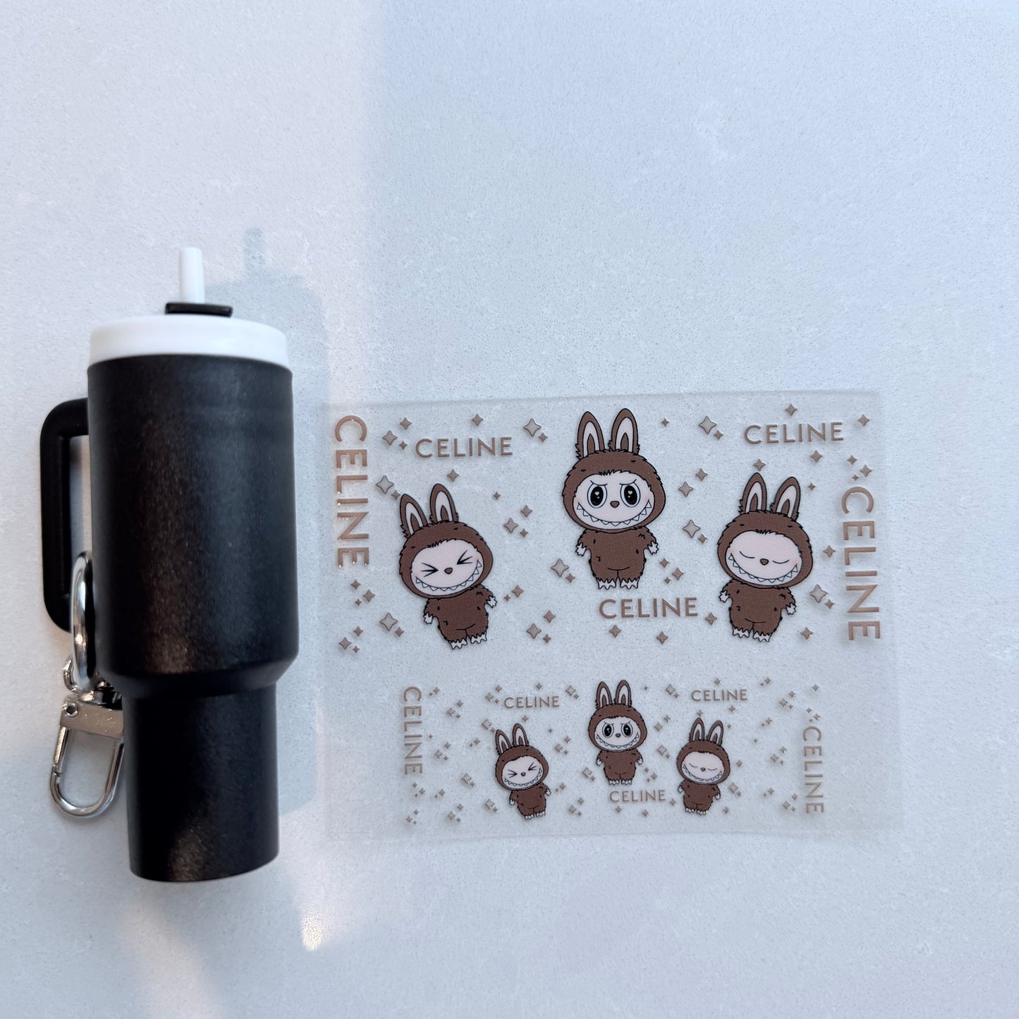 Premium UVDTF Wrap for Mini Tumbler Keychains | Durable, No-Weed Peel & Stick (designer brown labubu)